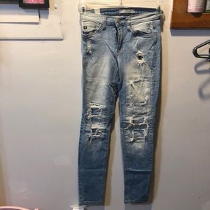 Light blue holey jeans